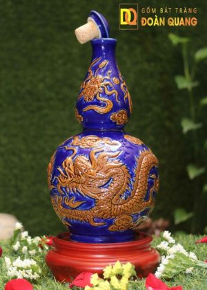 Nậm rượu men thúy lam rồng nổi